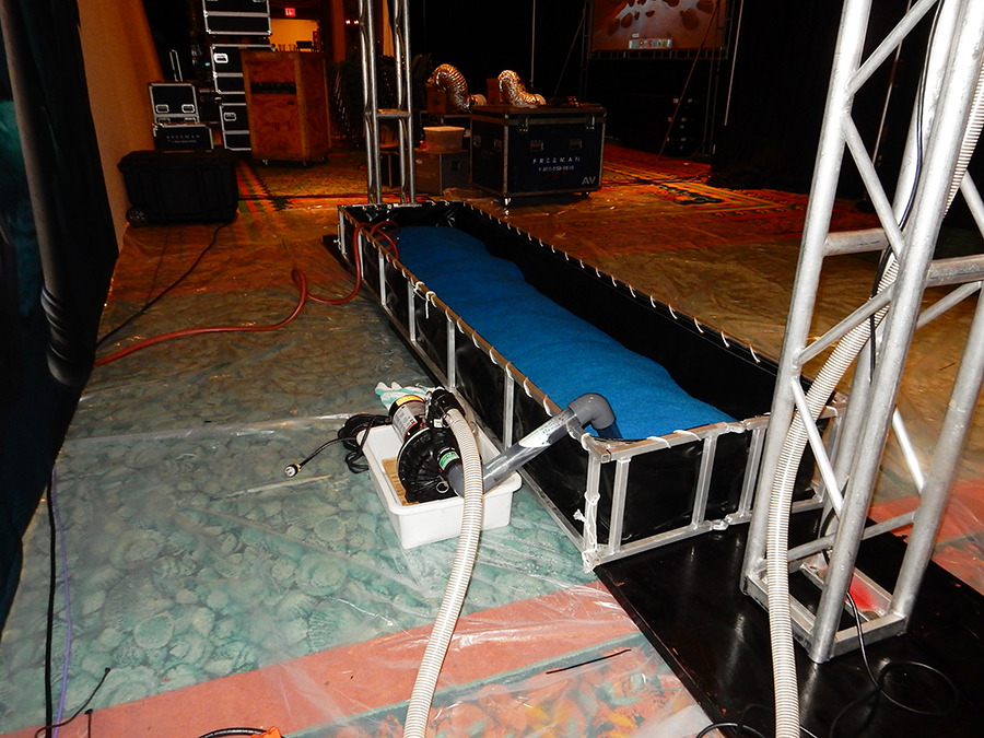 Tsunami Water Screen&trade; is a Water scrim, rain wall, video waterfall, water curtain, H2O screen, water curtain, projection screen.
